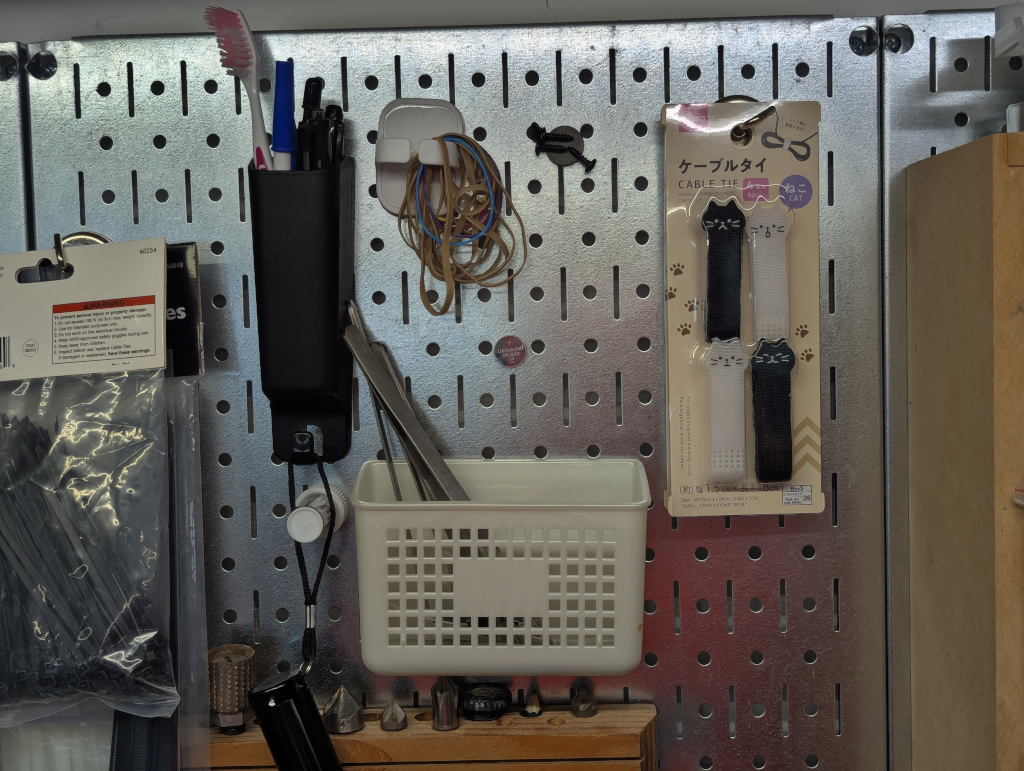 Magnetic pegboard, with many Daiso accessories...